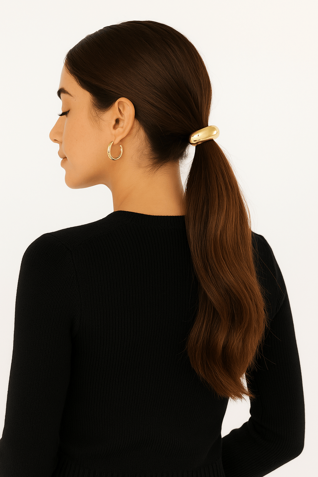 The Perfect Hoop Hair Hoop in gold, styled on a brunette model with hair pulled back, shown in profile on white background