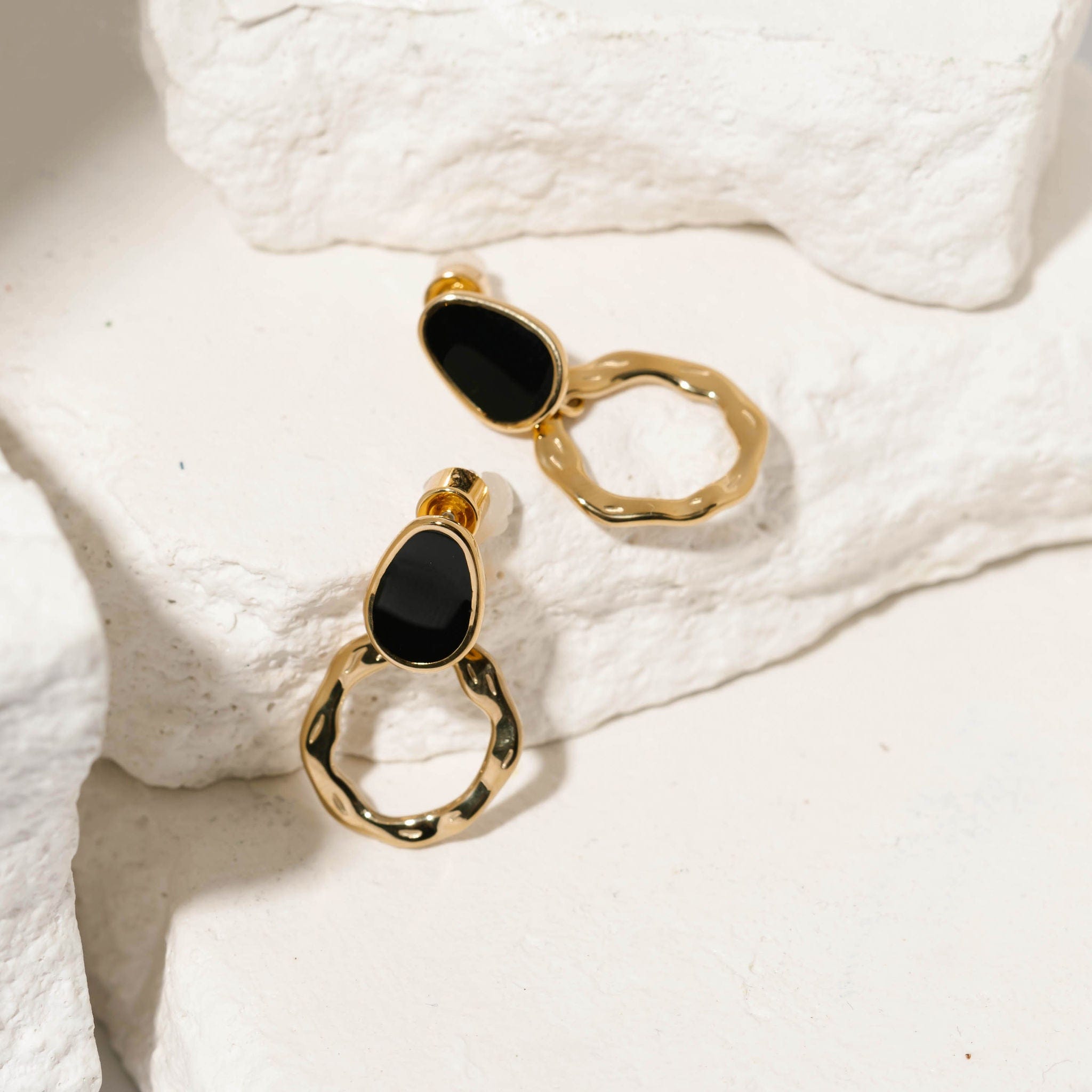 Caviar earrings deals