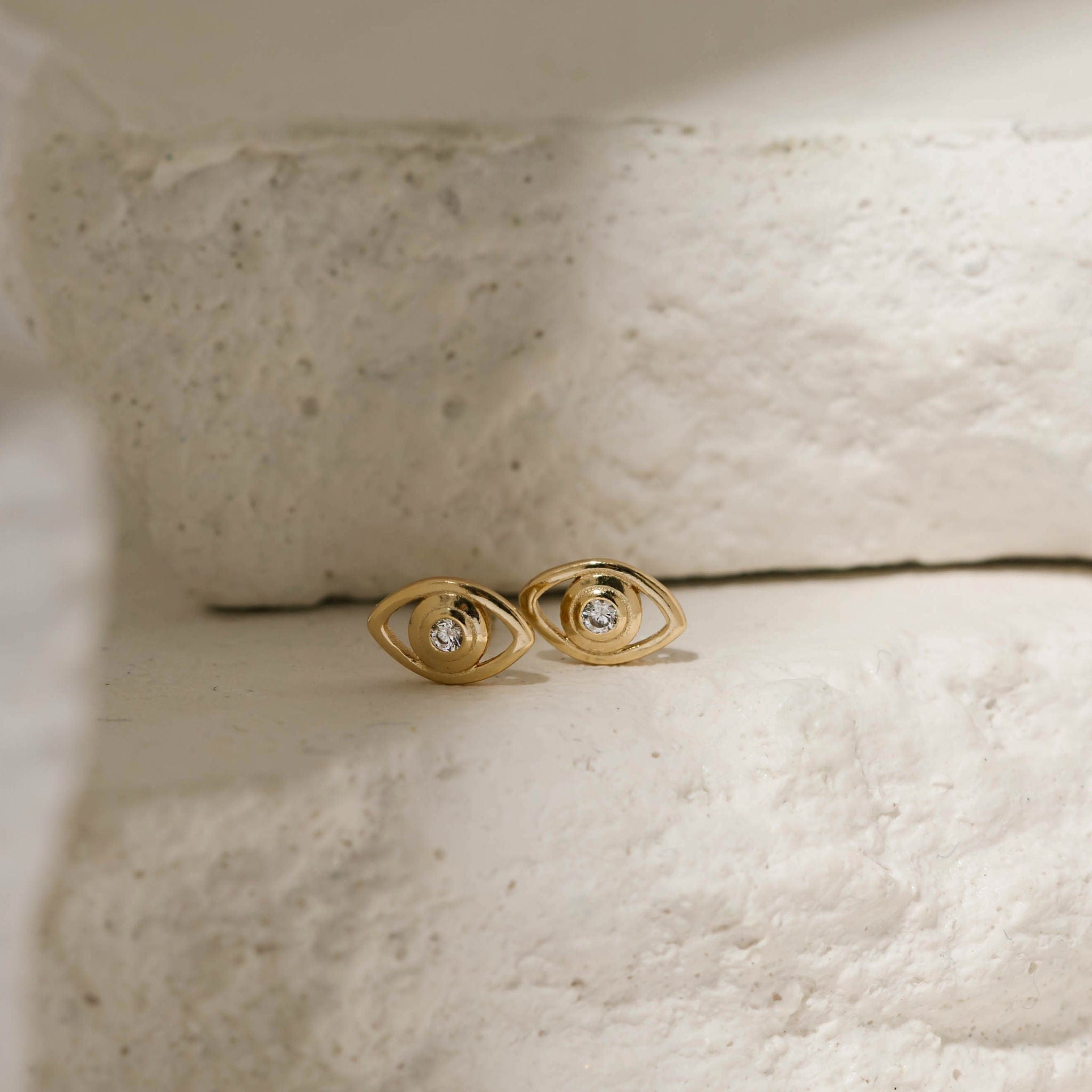 Gold evil eye stud earrings hotsell