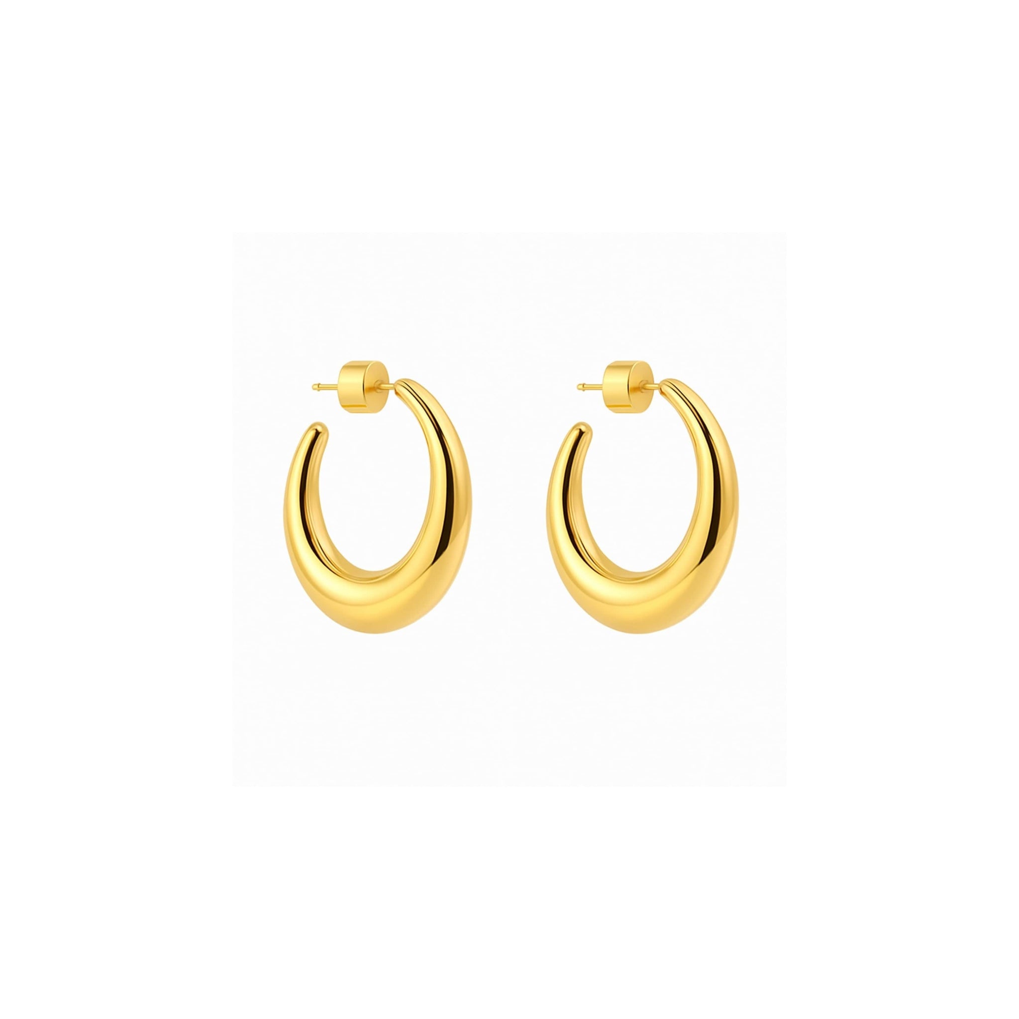 The Perfect Hoop Mezzaluna Hoop Mini in polished gold with a sleek crescent silhouette, displayed on white background.