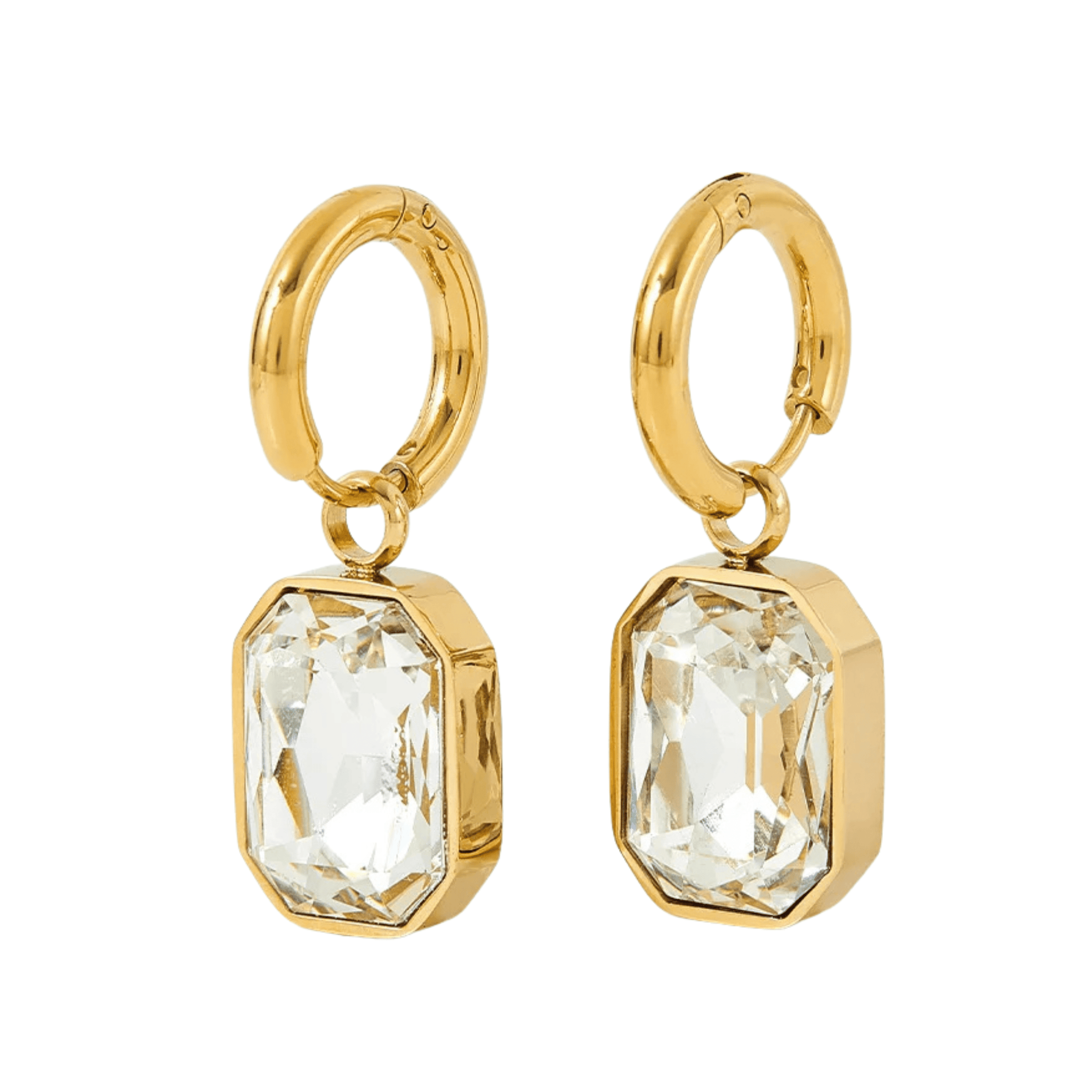 The Perfect Hoop Sahara Drop Hoop earrings in Clear Crystal shown on white background. Polished gold huggie with elegant clear crystal drop in emerald cut.