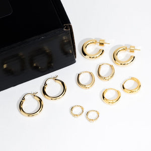 The five pairs of dainty, yet stylish earrings in the Active Girl Hoop Starter Pack lay side-by-side, the golden curves of each hoop gleaming in the light.
