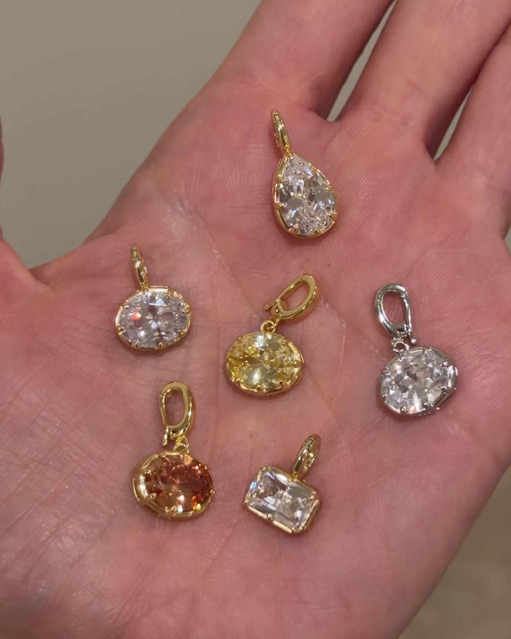 Video showcasing The Perfect Charm detachable necklace pendants by The Perfect Hoop, designed for the Sloane and Skylar necklaces.